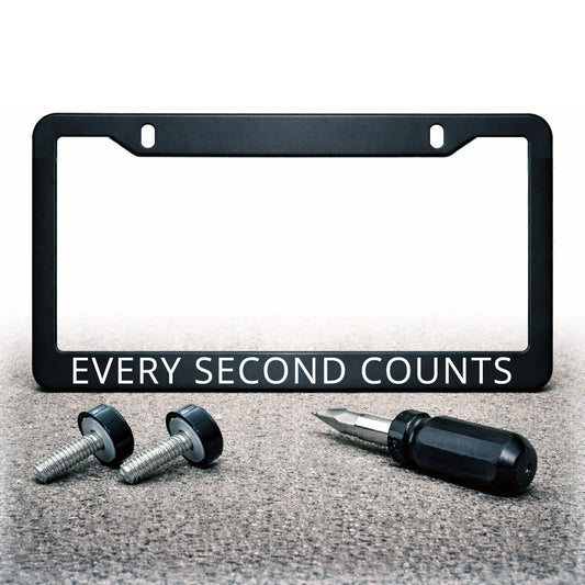 Every Second Counts license plate frame shown upright with mounting screws, black caps, and a mini screwdriver