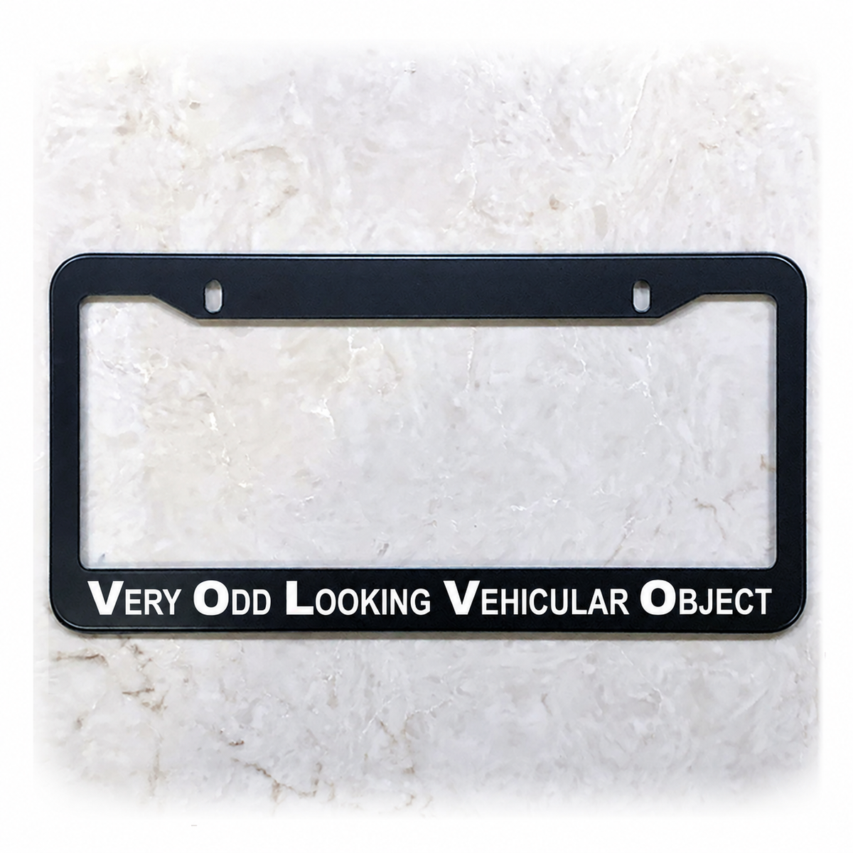 Very Odd Looking Vehicular Object license plate frame in stainless steel