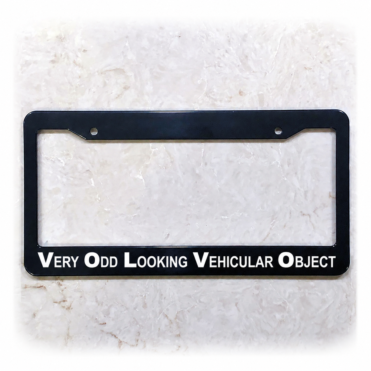 Very Odd Looking Vehicular Object license plate frame in ABS plastic