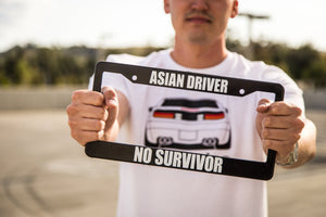 Man Holding ASIAN DRIVER NO SURVIVOR Meme Inspired License Plate Frame